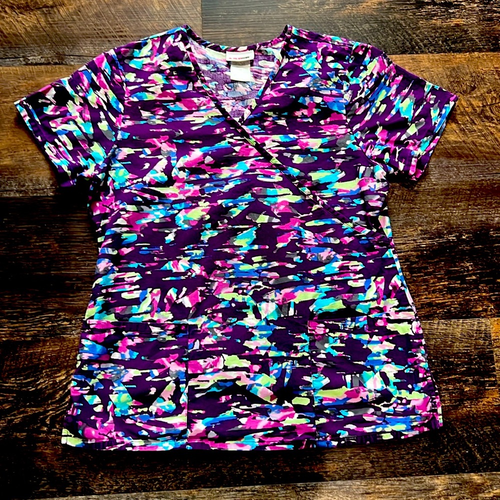 Women’s scrub top. Size medium. Multi color by scrub star.